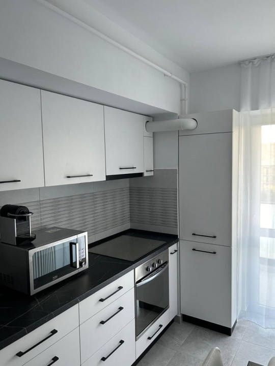 Apartament 2 camere de inchiriat la Conest Evolution in Dacia, cu loc parcare 