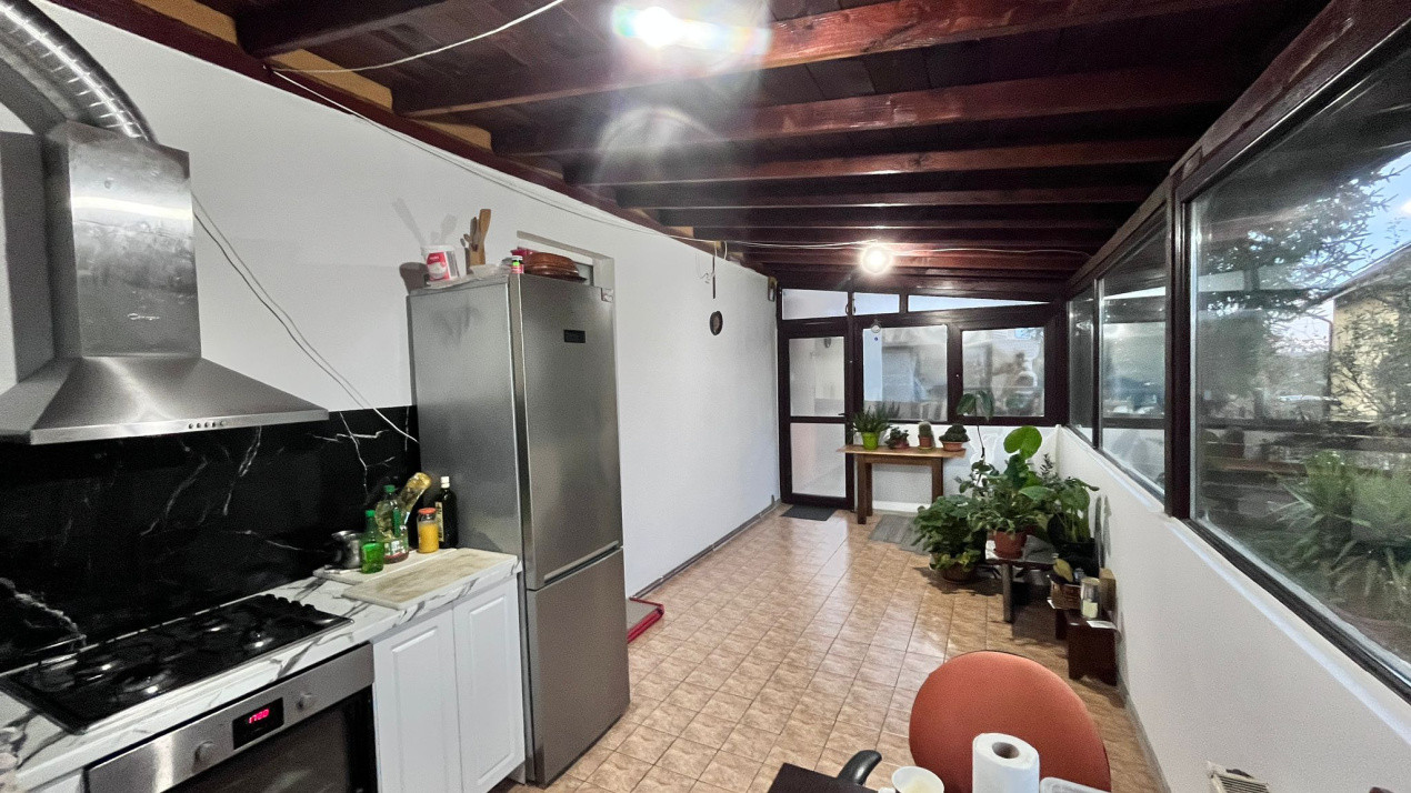 Apartament in bloc-vila, pe 2 nivele, demisol si parter, cu curte, in Bucium!